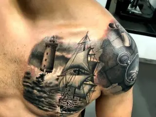 tatuaj corabie pe piept si umar barbat